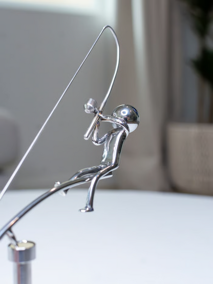 Niemals Aufhören Fischer-Balance-Skulptur